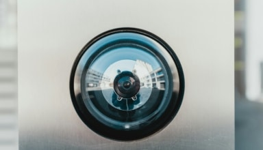 selective focus photography of lens