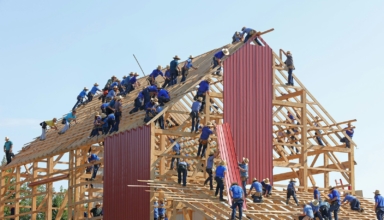 people building structure during daytime