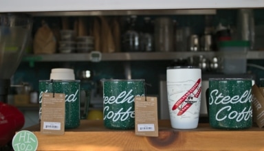 a display of coffee cups on a table