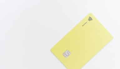 yellow square card on white surface