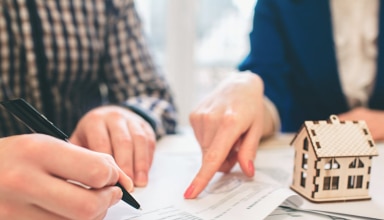 young family couple purchase rent property real estate . agent giving consultation to man and woman. signing contract for buying house or flat. sign a contract or agreement. business documentation